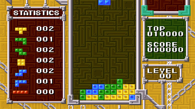 Tetris blocks descend as statistics are tallied on the left in Tetris & Dr. Mario