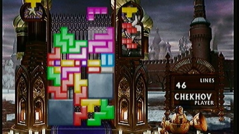 Tetris blocks are organized with a Russian-themed background in The New Tetris