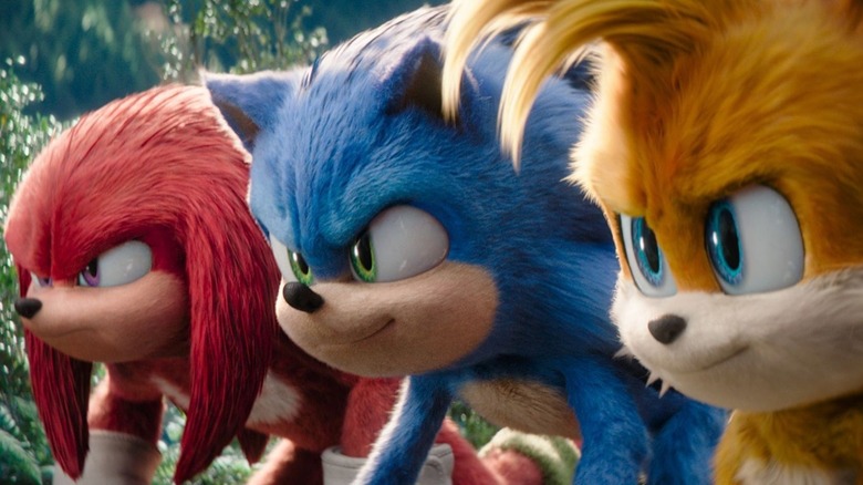Knuckles, Sonic, and Tails kneel together ready to race in Sonic the Hedgehog 3