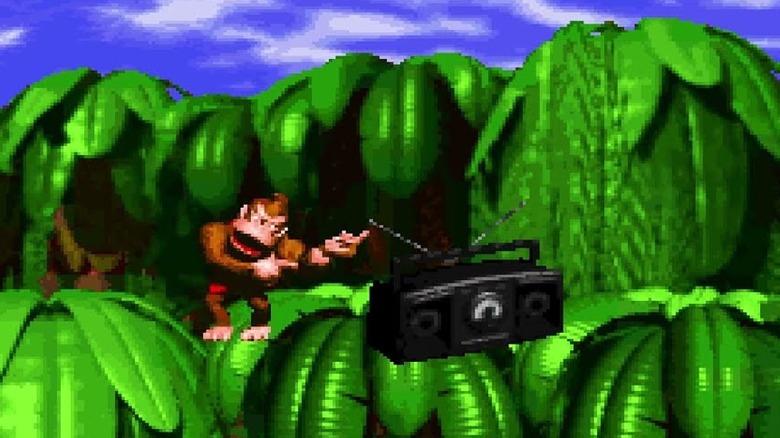 Donkey Kong listens to a boombox in Donkey Kong Country