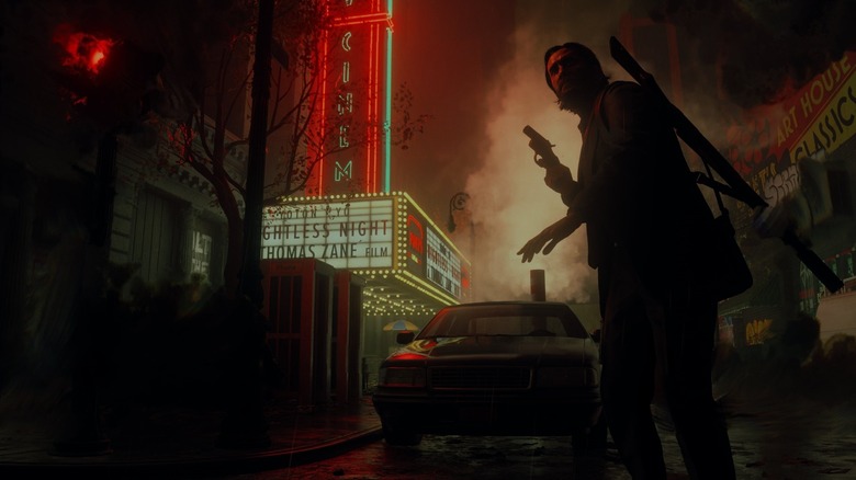 Alan Wake wandering through a dark street with a weapon