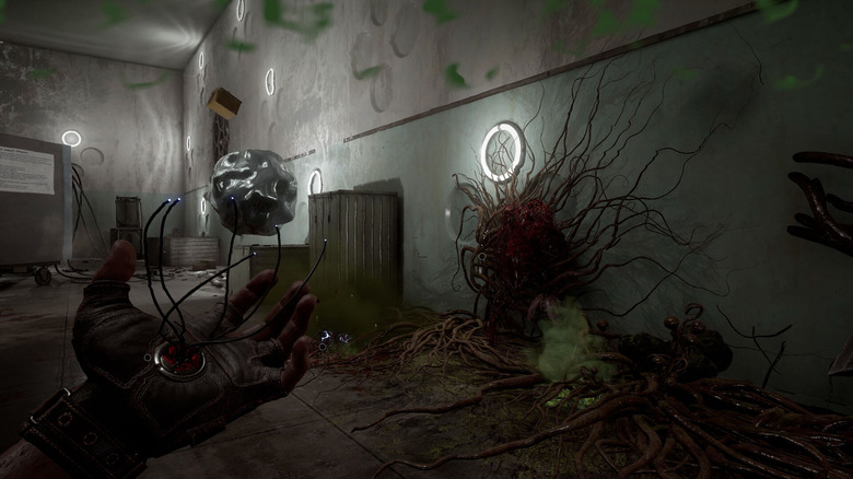 An Atomic Heart player looking a wall with a strange plant growing on it