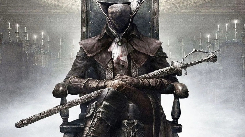 The Hunter sits in a chair holding his sword on the cover art for Bloodborne: The Old Hunters