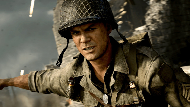 A soldier pointing in battle in Call of Duty: WWII
