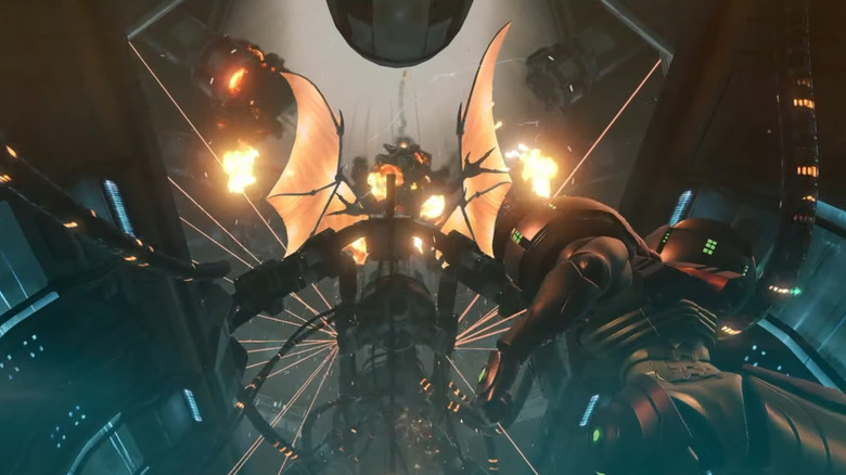 Samus looks up at an exploding Ridley in Metroid Prime Remastered (2023)