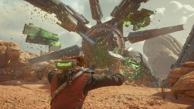 Cal Kestis using a Force push against a giant machine in Star Wars Jedi: Survivor (2023)