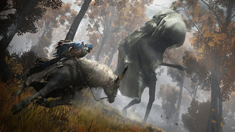 The Tarnished rides a horse around a large enemy in Elden Ring