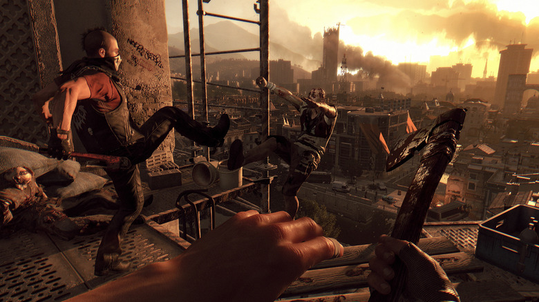 Kyle watches a human kick a zombie off a building in Dying Light