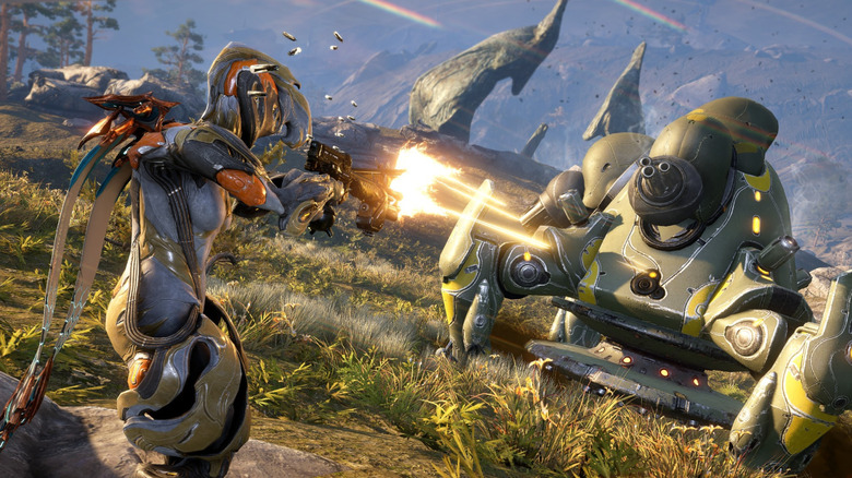 A player-controlled Ember frame fires on an enemy tank in Warframe