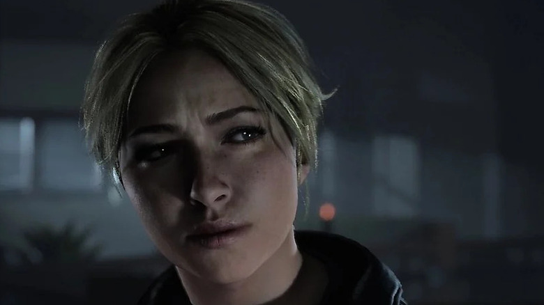 Sam Giddings eyes something suspiciously in Until Dawn