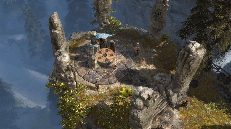 Player characters approach a ritual site on a cliff in Grim Dawn