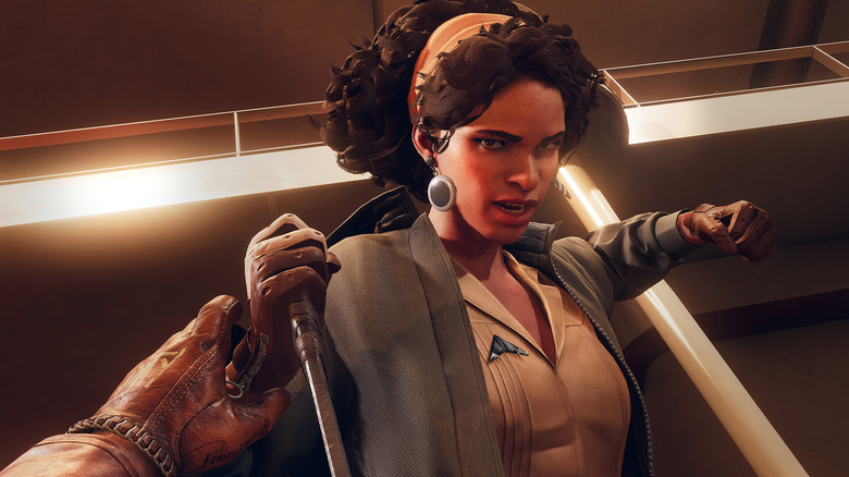 A Deathloop character interacting with Julianna up close