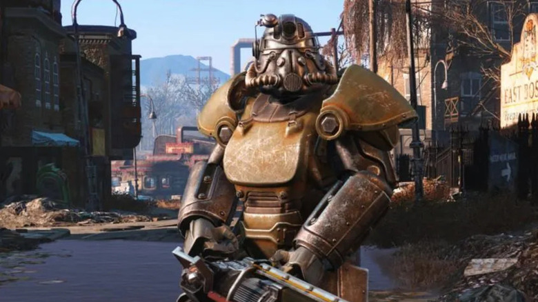 A Brotherhood of Steel soldier stands in the ruins of Boston in Fallout 4