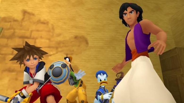 Sora with Aladdin, Goofy, and Donald Duck in Kingdom Hearts