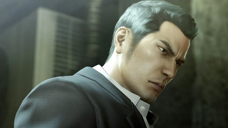 Kazuma Kiryu glares while looking down in "Yakuza 0" (2015)