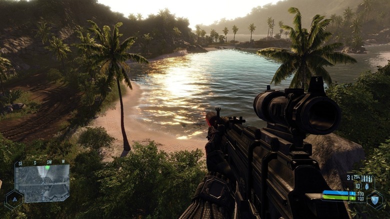 Jake Dunn holds an assault rifle while overseeing a tropical coastline in Crysis