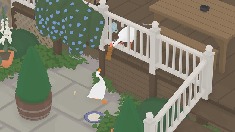 One goose handing an object to another in "Untitled Goose Game" (2019)