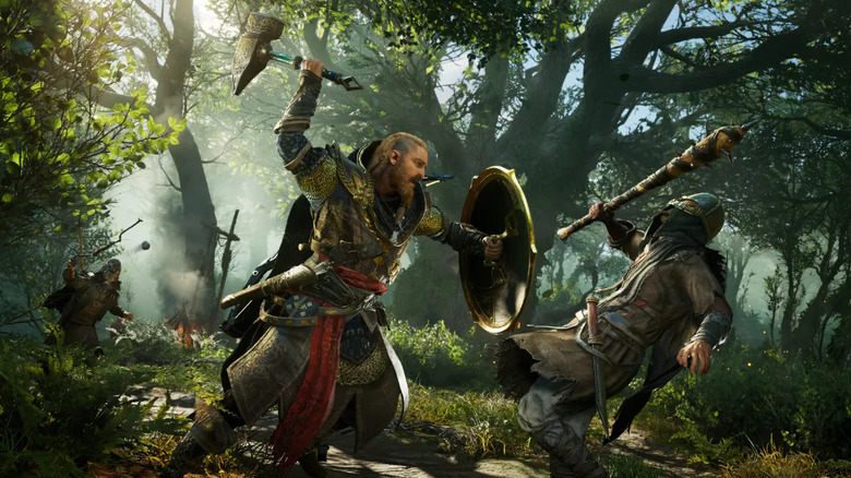 Eivor Varinsdottir attacks a warrior in the forest in Assassin's Creed Valhalla