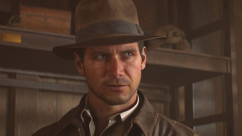 Indiana Jones smirks while in a train car in Indiana Jones and the Great Circle