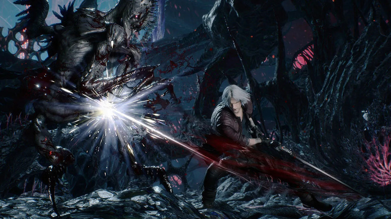 Dante slashes a large demon with a sword in Devil May Cry 5