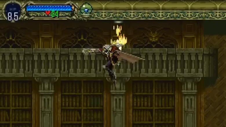 Alucard leaps and strikes a chandelier in "Castlevania: Symphony of the Night" (1997)