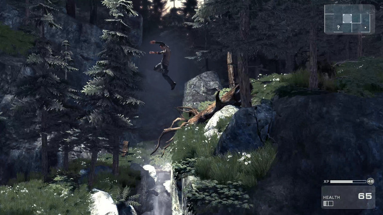 Jason Fleming leaps from a ledge in a forest in "Shadow Complex" (2009)