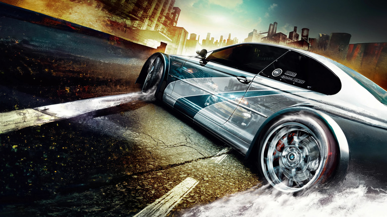 A sports car swerves with police cars reflected in its body on the cover art of Need for Speed: Most Wanted