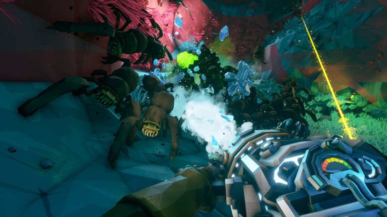 A player blasts incoming monsters with a futuristic gun in Deep Rock Galactic