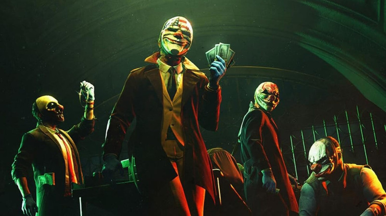 A group of masked crooks hold up money on the cover art for Payday 3