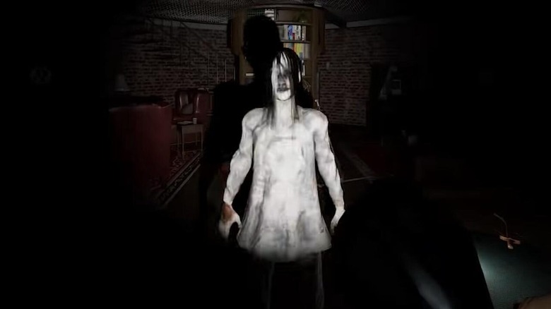 A ghost stands in a dark basement in Phasmophobia