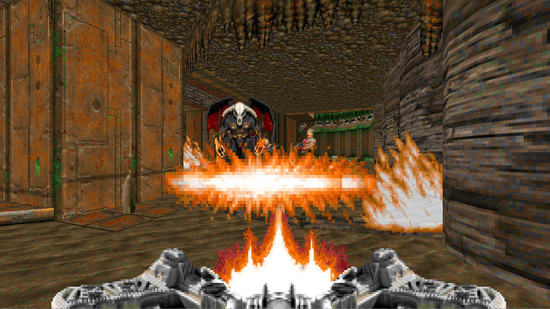 Doomguy fires a flame crossbow in Doom II