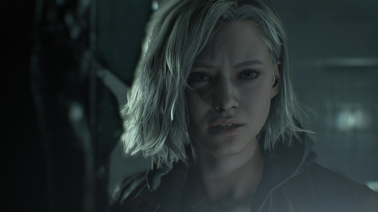 Grace Ashcroft peers into the darkness in Resident Evil Requiem