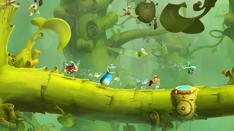 Rayman leads Globox and Barbara along a tree branch in Rayman Legends