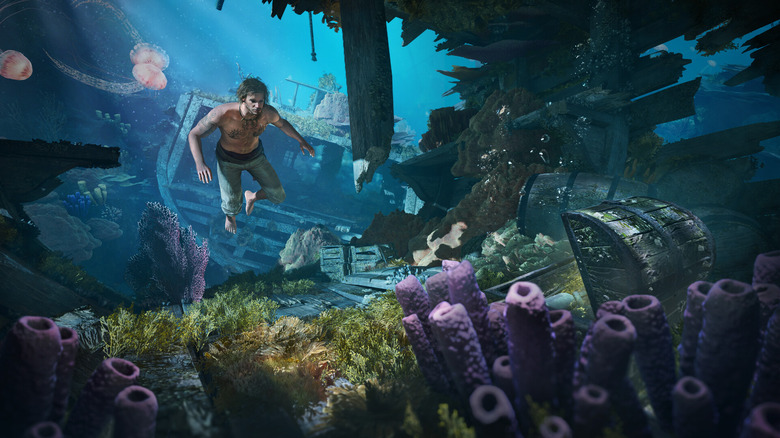 Edward Kenway swimming underwater looking for treasure
