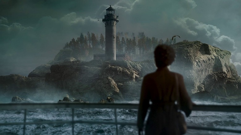 The player characters observes a lighthouse on a rocky coastline in Layers of Fear (2023)