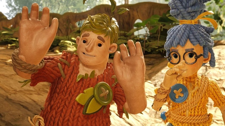 Cody and May as dolls in It Takes Two