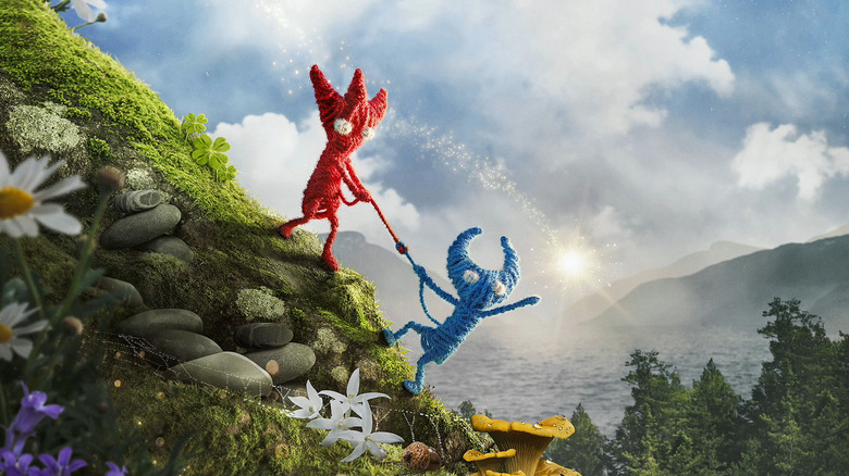 A red Yarny helps a blue Yarny up a hill as they reach for the light on the cover art for Unravel Two