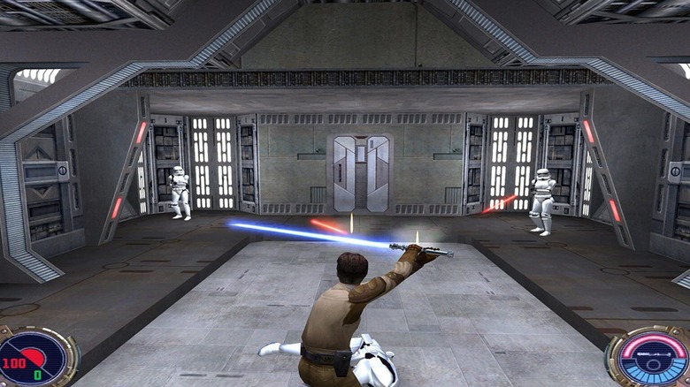 Jaden Korr deflects blaster bolts from Stormtroopers with their lightsaber in Star Wars Jedi Knight: Jedi Academy