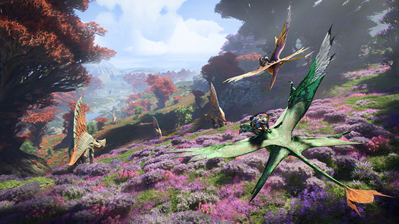 A character riding a mount across a colorful valley in Avatar: Frontiers of Pandora