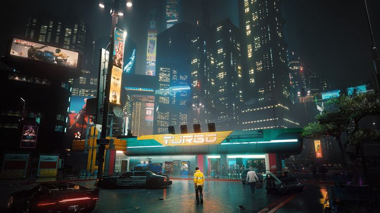 A Cyberpunk 2077 player standing in front of downtown Night City
