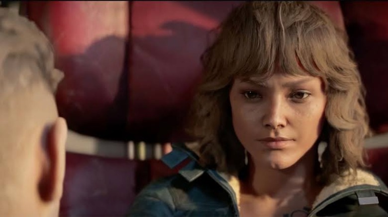 Kay Vess in a red seat, eying a guy in Star Wars Outlaws