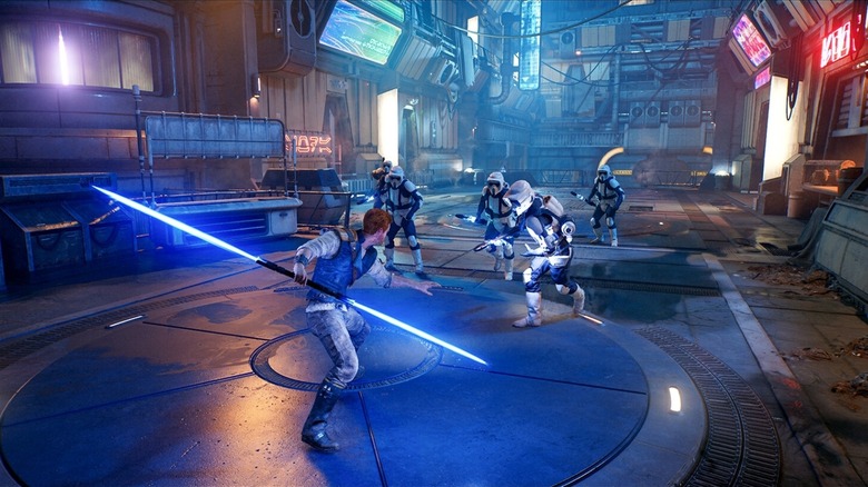 Cal Kestis fighting off enemies with a light saber