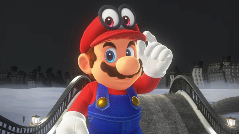 Mario adjusts Cappy on his head in Super Mario Odyssey