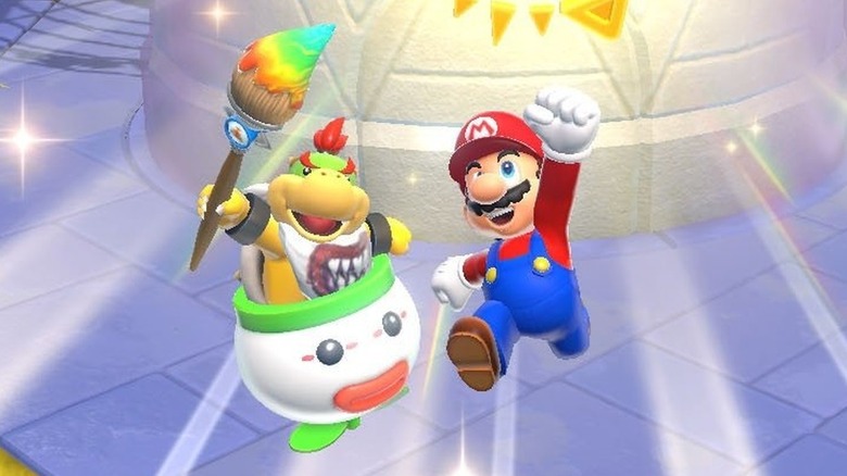Bowser Jr. and Mario leap up triumphantly in Super Mario 3D World + Bowser's Fury