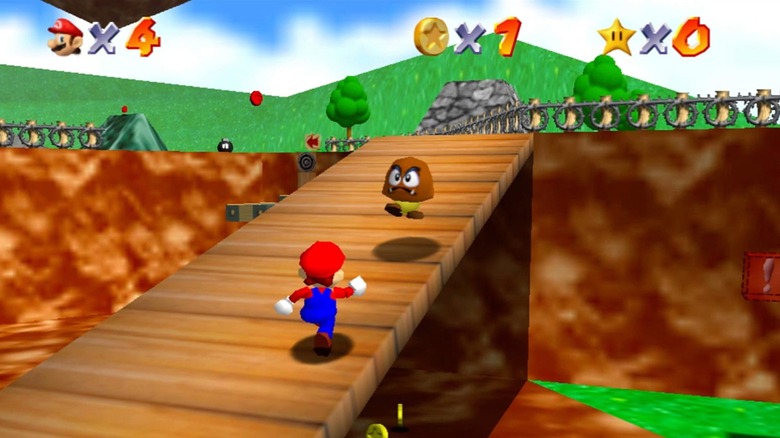 Mario runs up a wooden bridge towards a Goomba in Super Mario 64