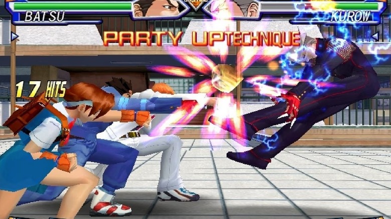 A team of three fighters punch Kurow in Project Justice: Rival Schools 2