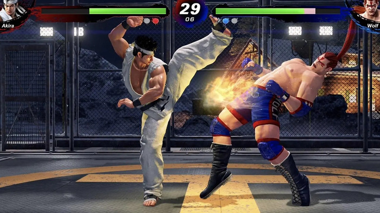 Akira kicks Wolf in the face in Virtua Fighter 5 Ultimate Showdown