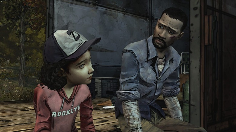 Lee Everett and Clementine sitting next to each other in The Walking Dead