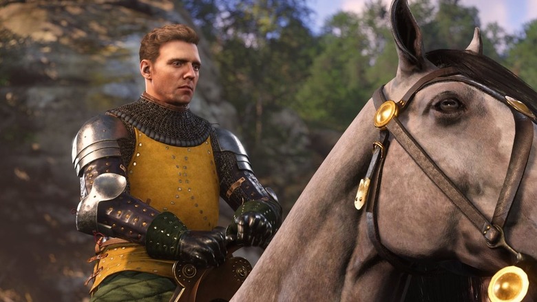 A knight rides his horse through a forest in Kingdom Come: Deliverance II