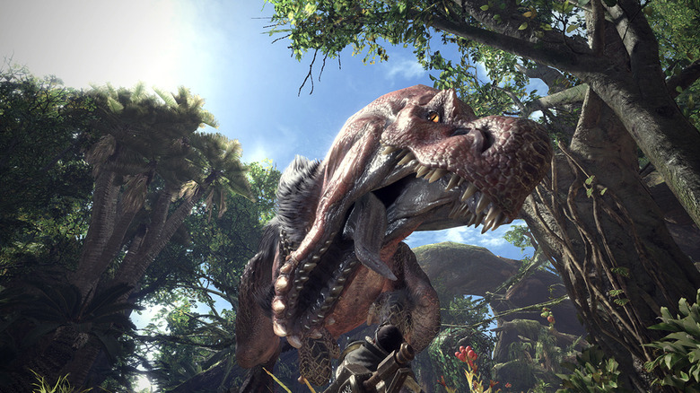 A huge dinosaur lunges at the Hunter in Monster Hunter: World
